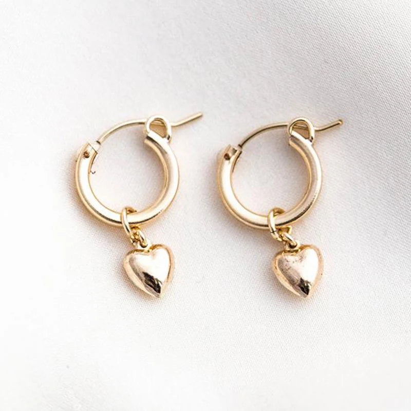 Heart EarringsSPECIFICATIONS
Metals Type: Gold filled
Item Weight: 1.2g
Earring Type: hoop earrings
Shape\pattern: Round
Type:: Dangle Earrings for Women
Color:: GoldChic ForeverHeart Earrings