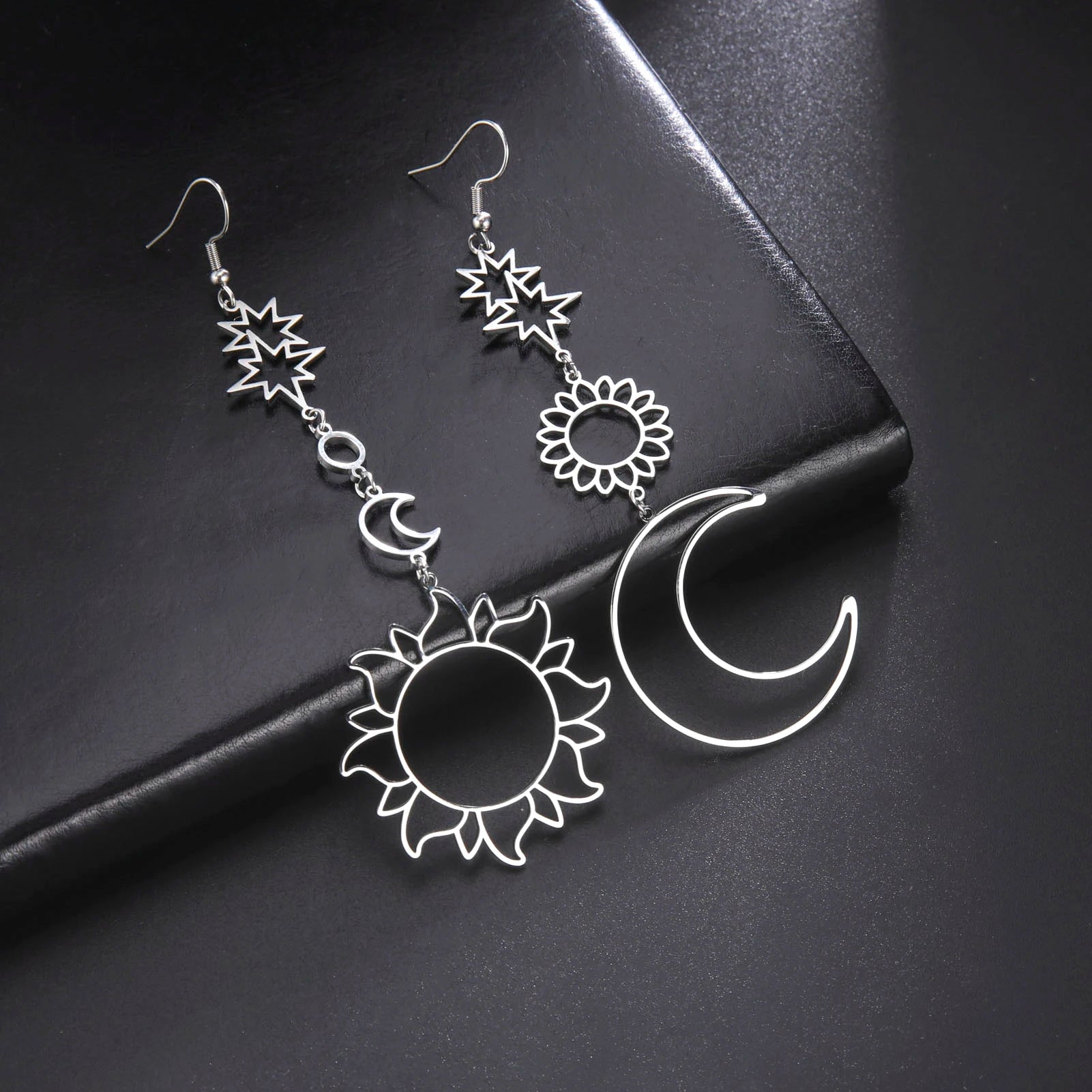 Syrim Long EarringsSPECIFICATIONS
Material: Metal
Metals Type: STAINLESS STEEL
Earring Type: drop earrings
Shape\pattern: Moon
Color: Steel / Gold
Why choose: 1. No rust; 2. Not AllergChic ForeverSyrim Long Earrings