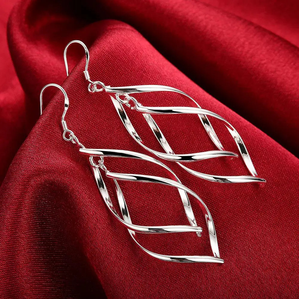 Dona long EarringsSPECIFICATIONS

Metal Stamp: 925,Sterling

Style: Ethnic

Item Weight: 6

Metals Type: silver

Earring Type: drop earrings

Shape\pattern: GeometricChic ForeverDona long Earrings