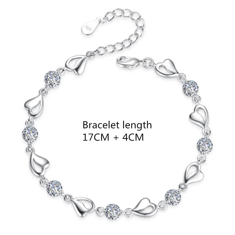 Bela BraceletSPECIFICATIONS
Metal Stamp: 925,Sterling
Metals Type: silver
Main Stone: Zircon
Item Weight: 6g
Side Stone: CRYSTAL
Shape\pattern: HEARTChic ForeverBela Bracelet