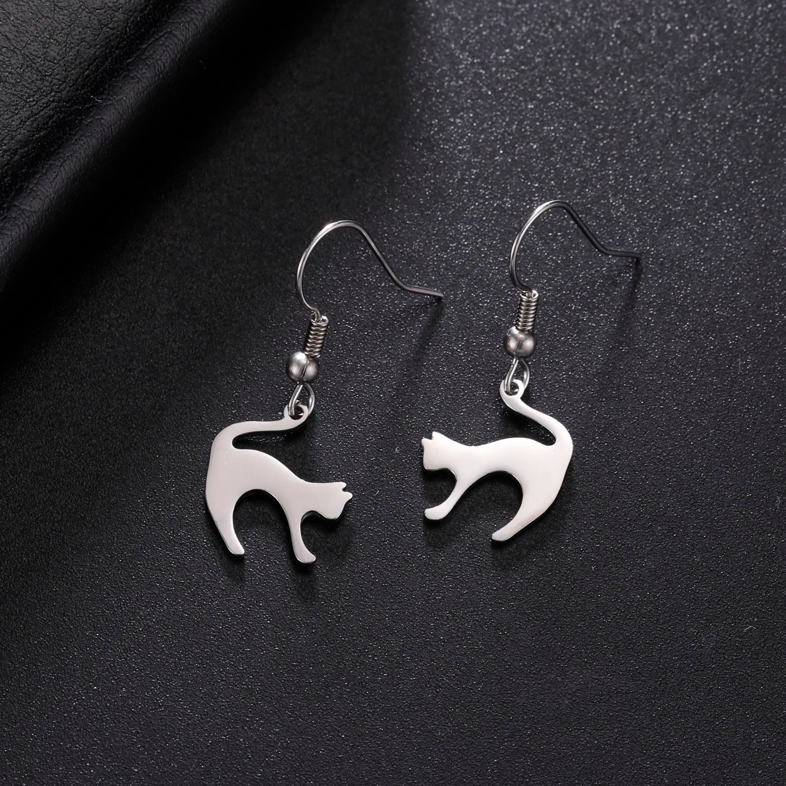 Cat EarringSPECIFICATIONS
Material: Metal
Metals Type: STAINLESS STEEL
Earring Type: drop earrings
Shape\pattern: Animal
Color: Gold Color/Steel Color
Quantity: 1pcs
Feature: NChic ForeverCat Earring