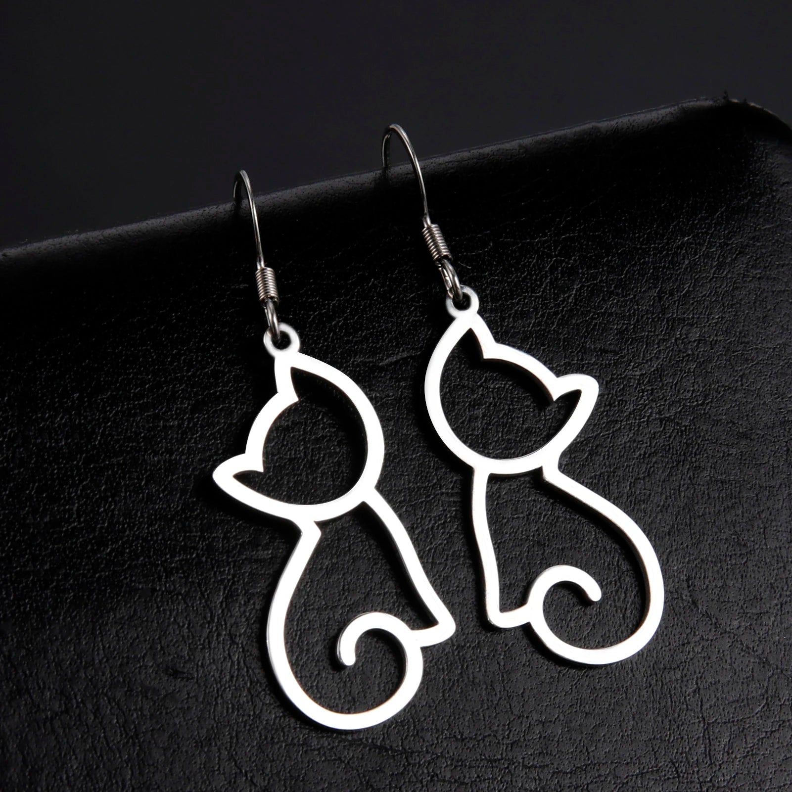 Cat EarringSPECIFICATIONS
Material: Metal
Metals Type: STAINLESS STEEL
Earring Type: drop earrings
Shape\pattern: Animal
Color: Gold Color/Steel Color
Quantity: 1pcs
Feature: NChic ForeverCat Earring