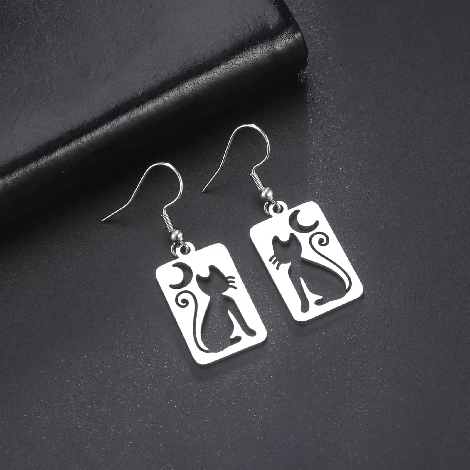 Cat EarringSPECIFICATIONS
Material: Metal
Metals Type: STAINLESS STEEL
Earring Type: drop earrings
Shape\pattern: Animal
Color: Gold Color/Steel Color
Quantity: 1pcs
Feature: NChic ForeverCat Earring