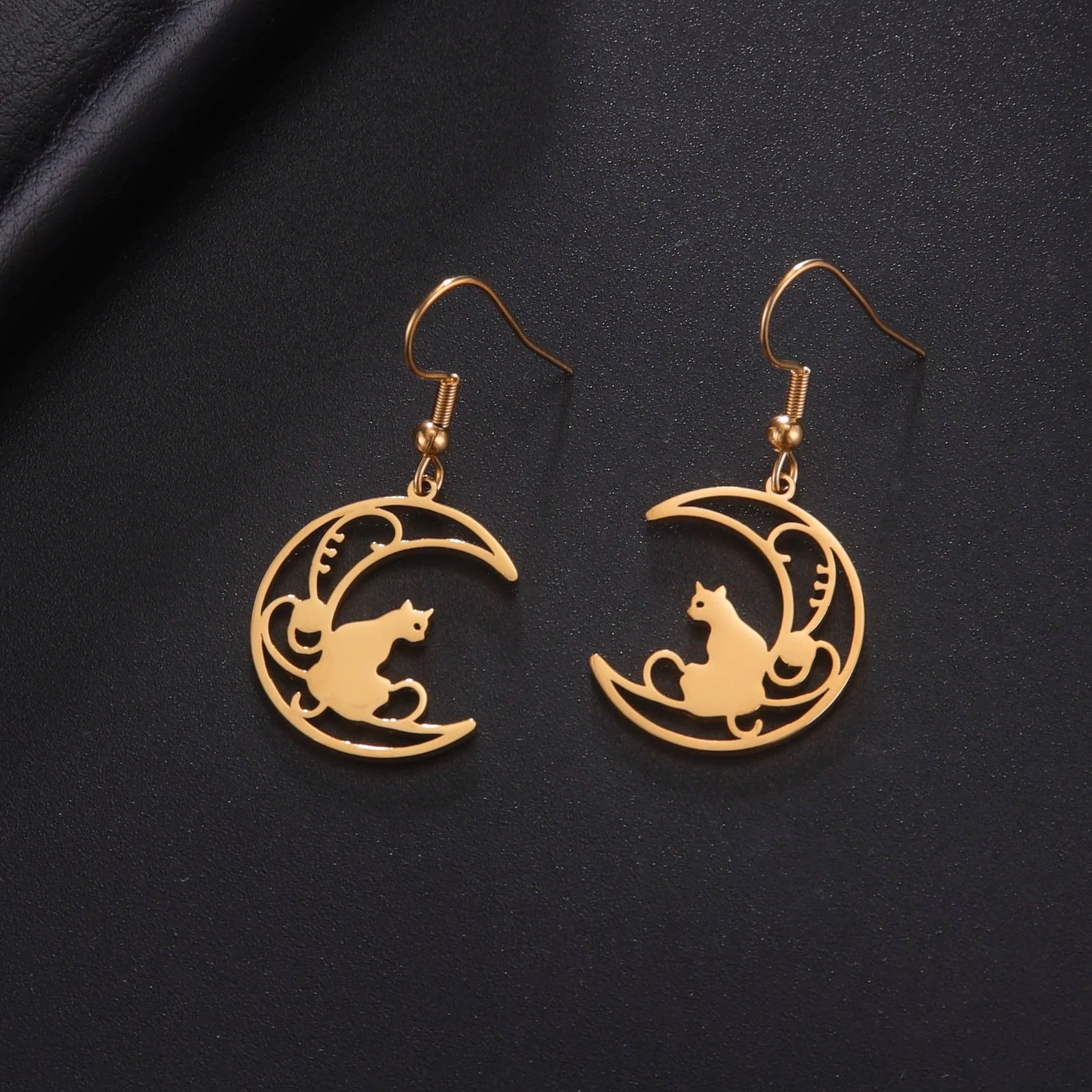 Cat EarringSPECIFICATIONS
Material: Metal
Metals Type: STAINLESS STEEL
Earring Type: drop earrings
Shape\pattern: Animal
Color: Gold Color/Steel Color
Quantity: 1pcs
Feature: NChic ForeverCat Earring