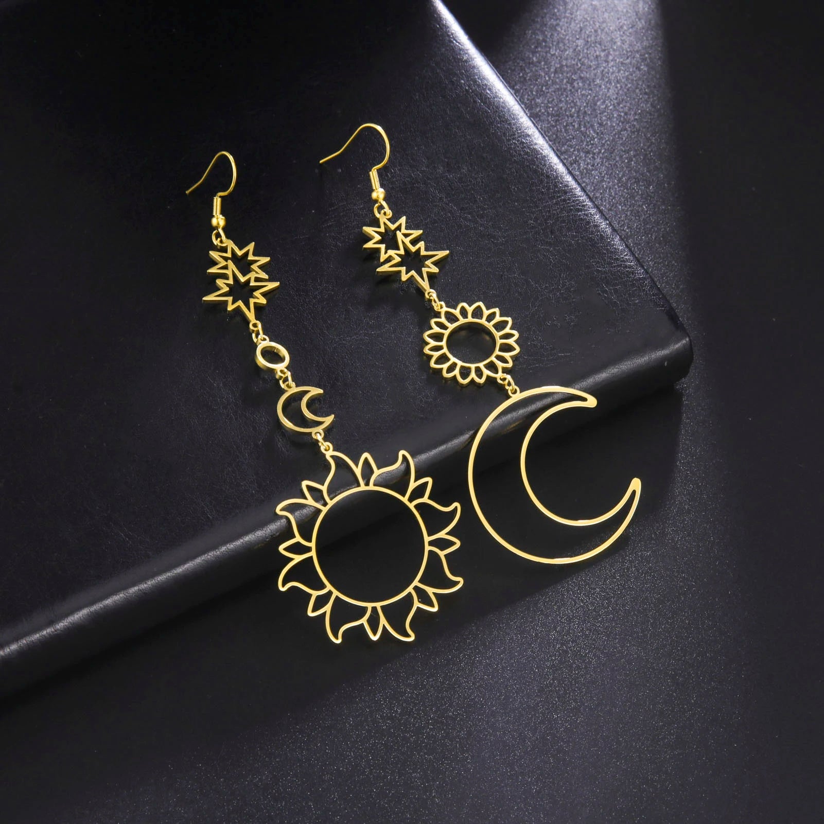 Syrim Long EarringsSPECIFICATIONS
Material: Metal
Metals Type: STAINLESS STEEL
Earring Type: drop earrings
Shape\pattern: Moon
Color: Steel / Gold
Why choose: 1. No rust; 2. Not AllergChic ForeverSyrim Long Earrings