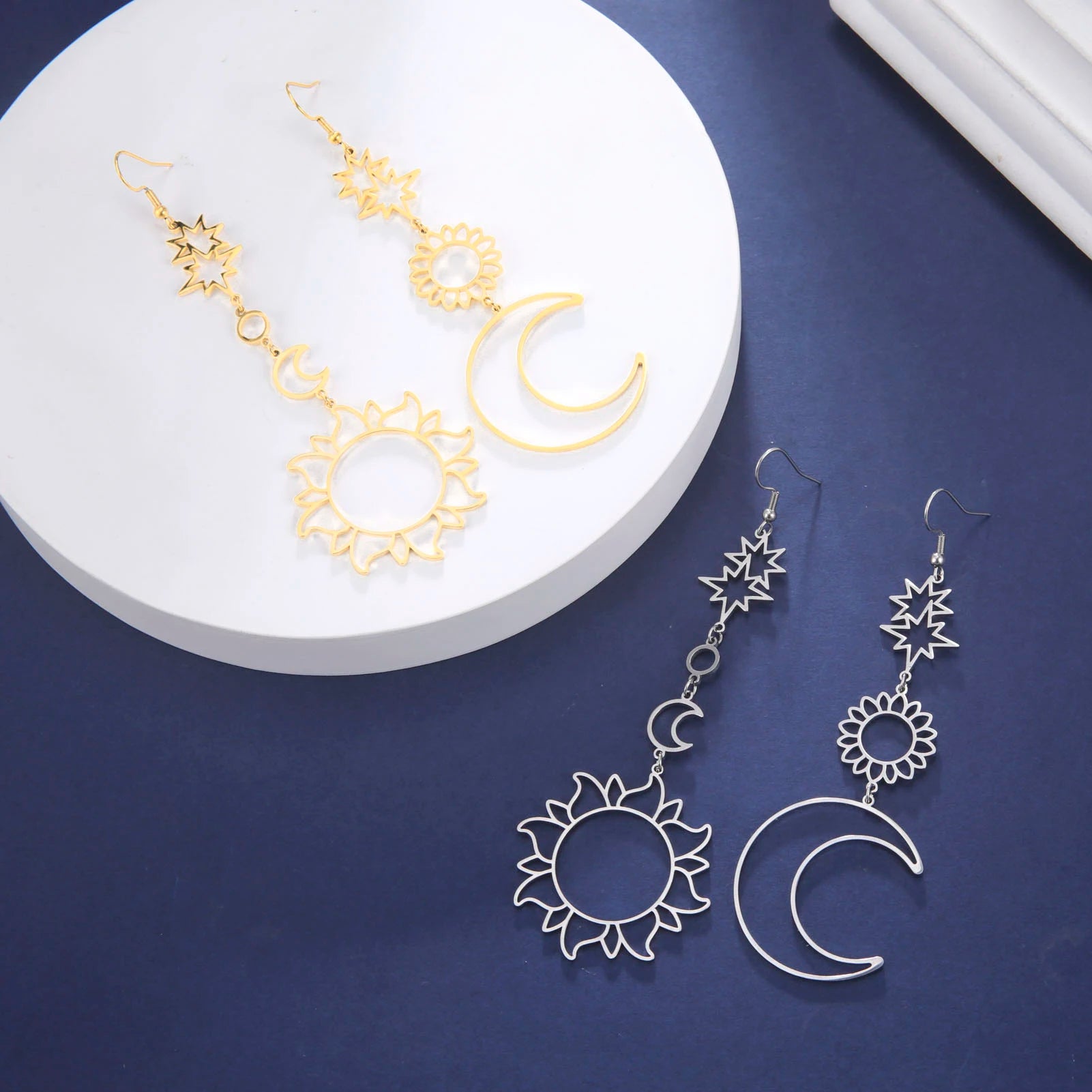 Syrim Long EarringsSPECIFICATIONS
Material: Metal
Metals Type: STAINLESS STEEL
Earring Type: drop earrings
Shape\pattern: Moon
Color: Steel / Gold
Why choose: 1. No rust; 2. Not AllergChic ForeverSyrim Long Earrings