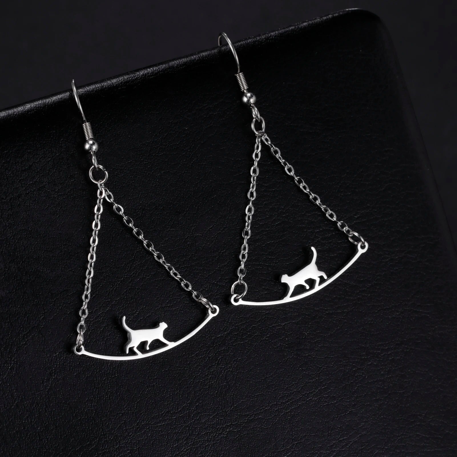 Cat EarringSPECIFICATIONS
Material: Metal
Metals Type: STAINLESS STEEL
Earring Type: drop earrings
Shape\pattern: Animal
Color: Gold Color/Steel Color
Quantity: 1pcs
Feature: NChic ForeverCat Earring