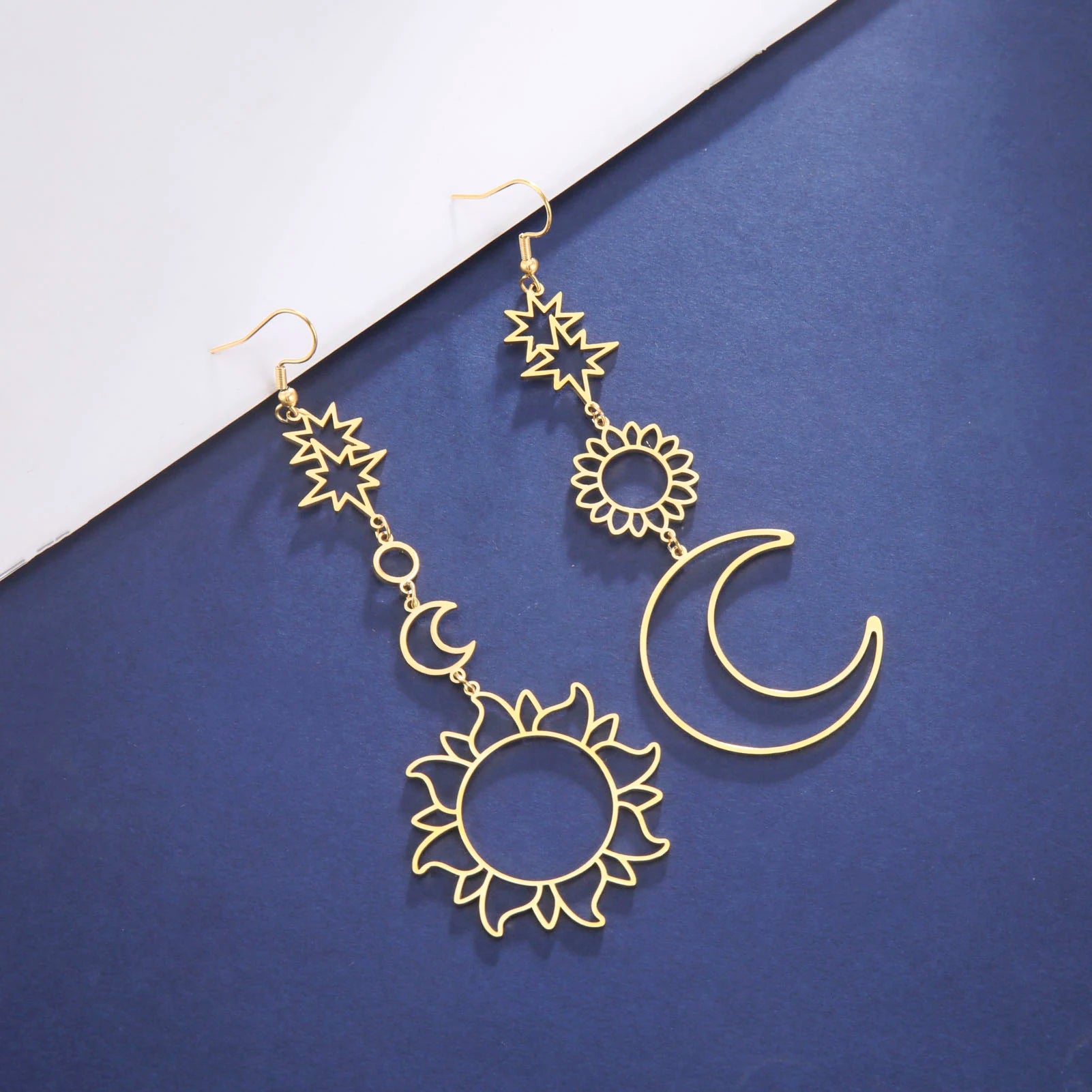 Syrim Long EarringsSPECIFICATIONS
Material: Metal
Metals Type: STAINLESS STEEL
Earring Type: drop earrings
Shape\pattern: Moon
Color: Steel / Gold
Why choose: 1. No rust; 2. Not AllergChic ForeverSyrim Long Earrings