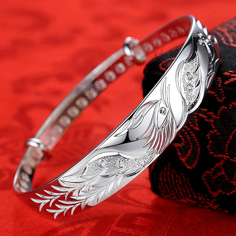 Phoenix braceletsSPECIFICATIONS
Metal Stamp: 925,Sterling
Style: Classic
Is Resizable: Yes
Metals Type: silver
Item Weight: 11g
Bracelets Type: Cuff Bracelet
Shape\pattern: AnimalChic ForeverPhoenix bracelets