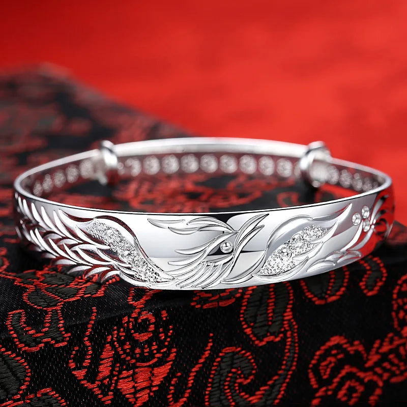 Phoenix braceletsSPECIFICATIONS
Metal Stamp: 925,Sterling
Style: Classic
Is Resizable: Yes
Metals Type: silver
Item Weight: 11g
Bracelets Type: Cuff Bracelet
Shape\pattern: AnimalChic ForeverPhoenix bracelets