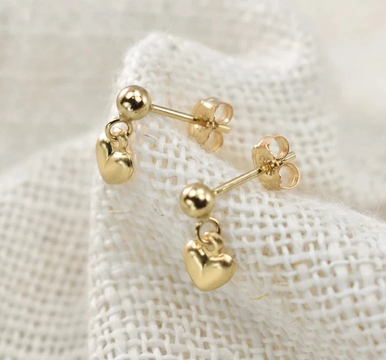 Heart Gold EarringsSPECIFICATIONS
Metals Type: Gold filled
Item Weight: 1g
Certificate Type: GTC
Earring Type: drop earrings
Shape\pattern: RoundearringChic ForeverHeart Gold Earrings