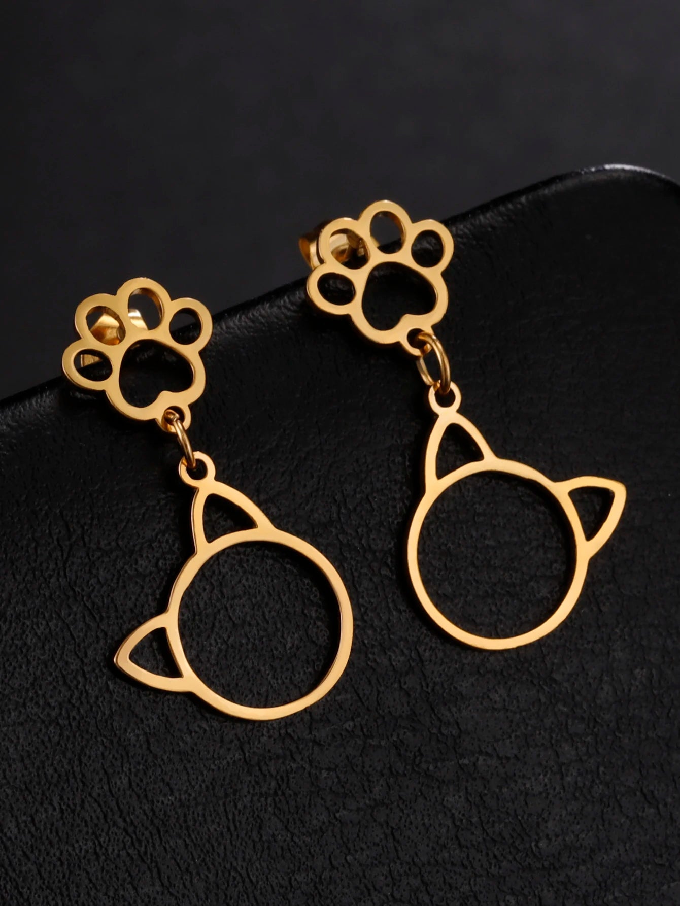 Cat EarringSPECIFICATIONS
Material: Metal
Metals Type: STAINLESS STEEL
Earring Type: drop earrings
Shape\pattern: Animal
Color: Gold Color/Steel Color
Quantity: 1pcs
Feature: NChic ForeverCat Earring