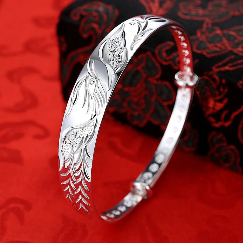 Phoenix braceletsSPECIFICATIONS
Metal Stamp: 925,Sterling
Style: Classic
Is Resizable: Yes
Metals Type: silver
Item Weight: 11g
Bracelets Type: Cuff Bracelet
Shape\pattern: AnimalChic ForeverPhoenix bracelets